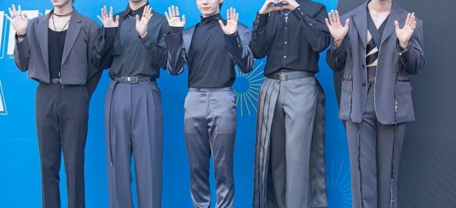 ONEUS performing live on stage, all five members together in 2023